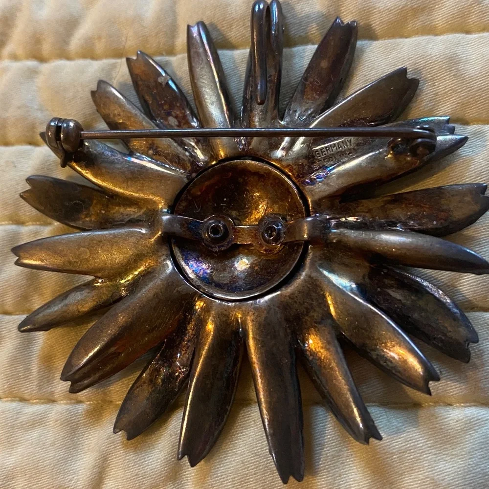 Antique sterling silver marcasite sunflower brooch.